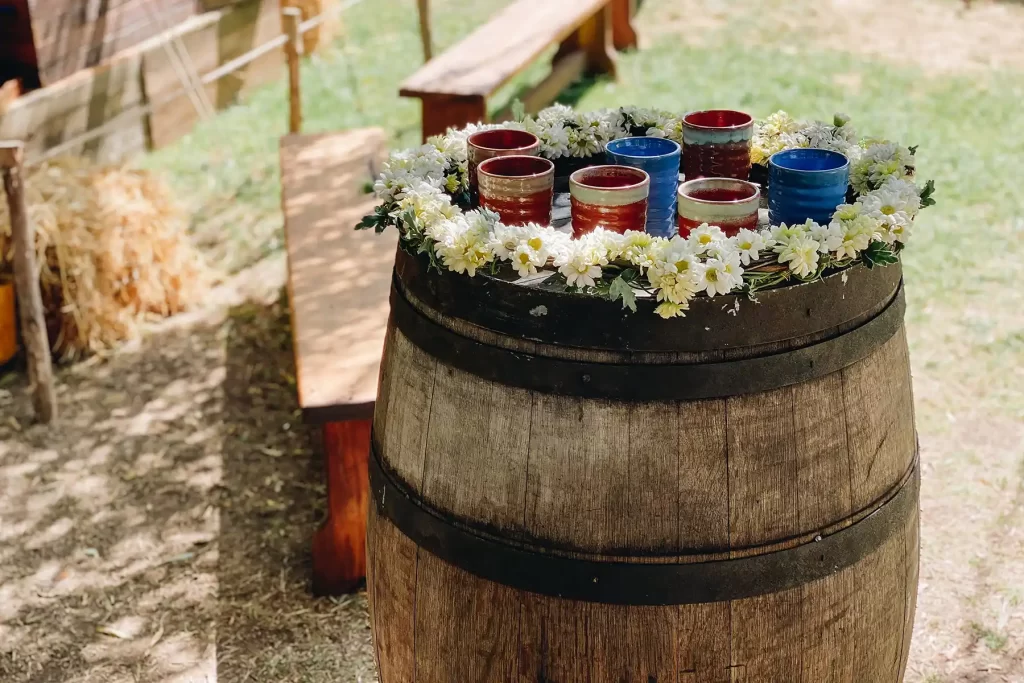 Hobbiton mugs on barrel.