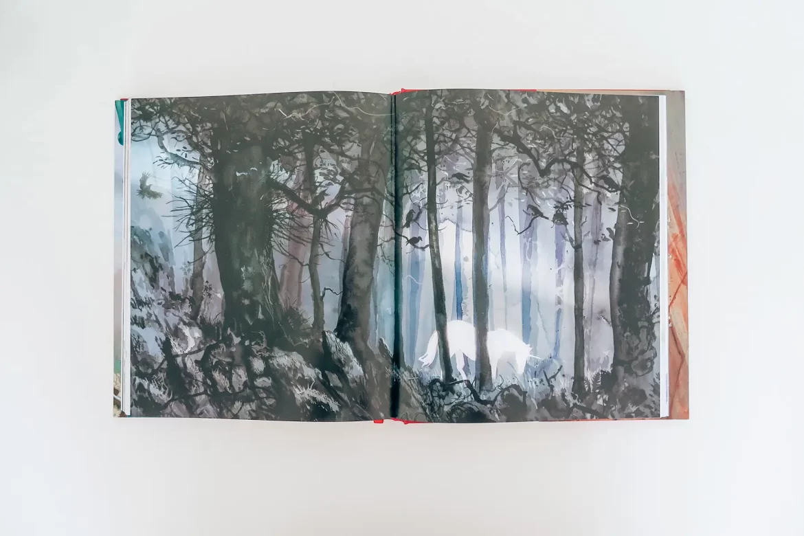 Open book spread of an illustration of the Forbidden Forest from Harry Potter for the blog post 5 Reasons to Read Fantasy.